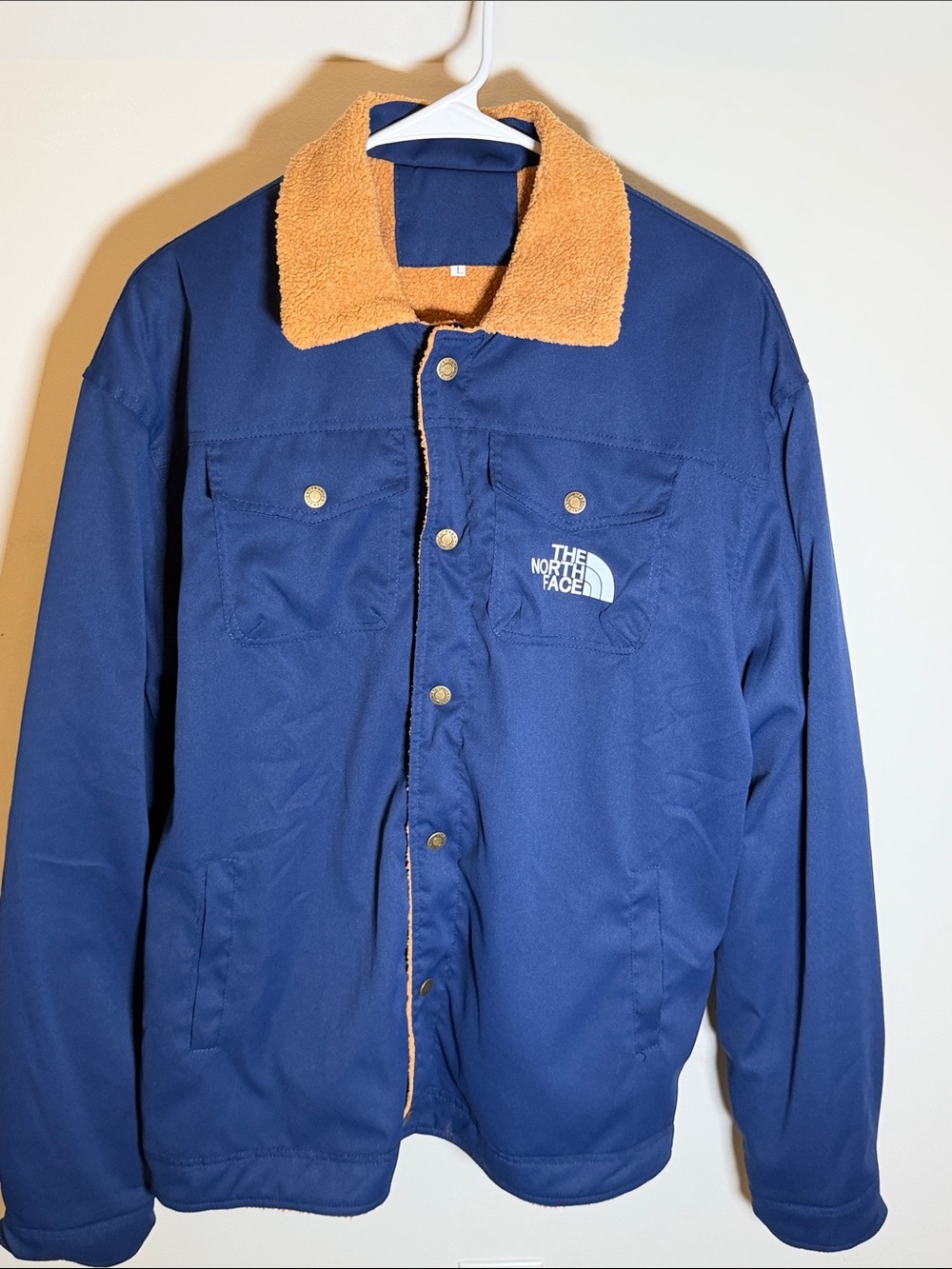 The North Face Navy Jacket with Tan Sherpa Collar